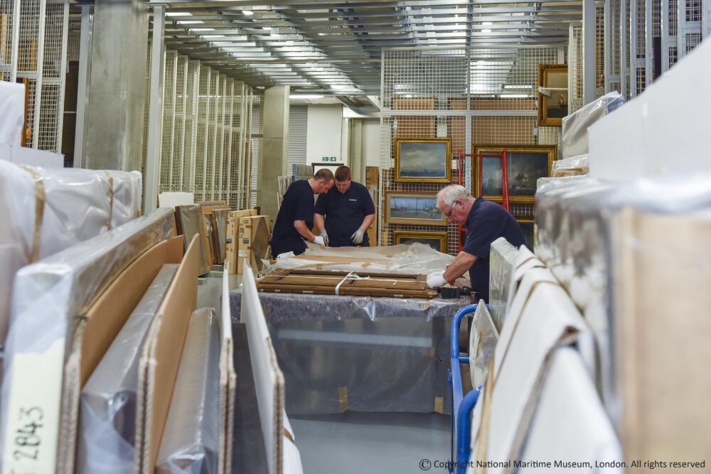 Constantine Ltd hanging paintings in storage for the National Maritime Museum