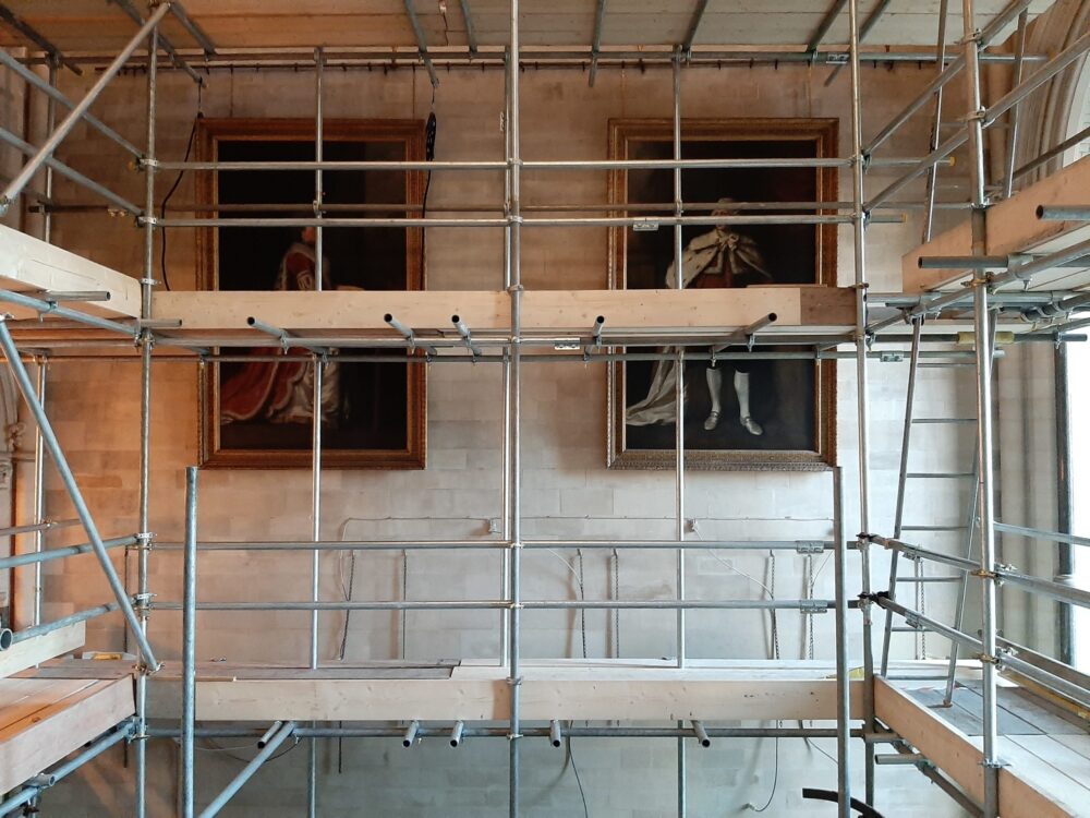 Installation of two Opie portraits of the 10th Duke and Duchess of Norfolk to hang in the tapestries place.
