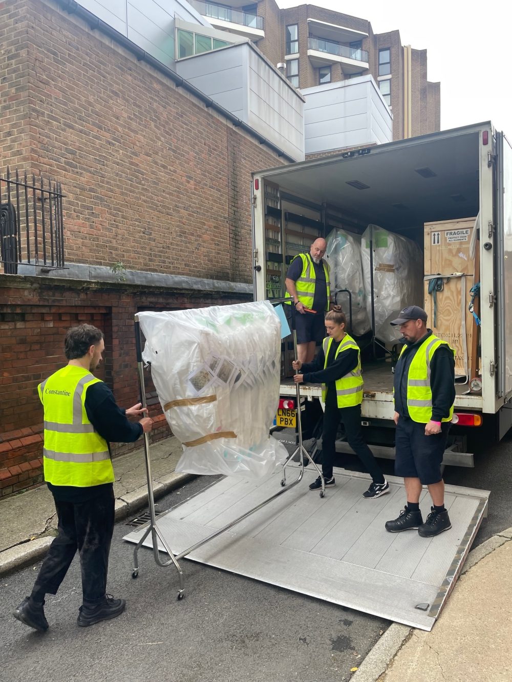 Constantine workers transporting museum objects